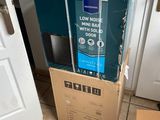 boxes are stacked on top of each other in a room