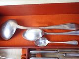 several spoons and spoon spoons are in a red box