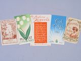 five different types of cards on a blue surface