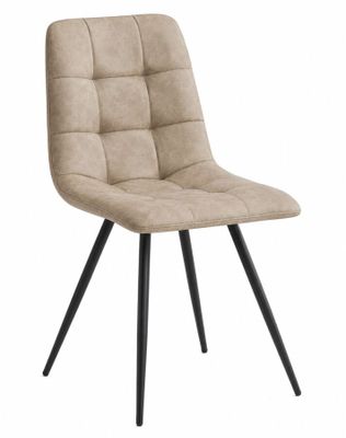 un gros plan d'une chaise beige aux pieds noirs sur fond blanc
