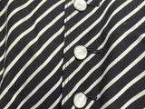 black and white striped dress with buttons down the front