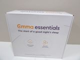 une boîte blanche sur laquelle est inscrit « gamma essentials »