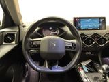 the interior of a car with a steering wheel, dashboard, and dash board