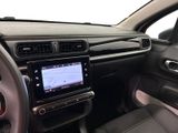 the interior of a car with a steering wheel and dashboard