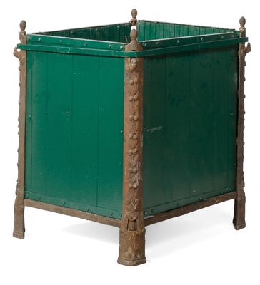pair of green metal planters on wooden bases