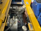 a large engine in the back of a truck
