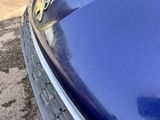 a close up of a car ' s front bumper
