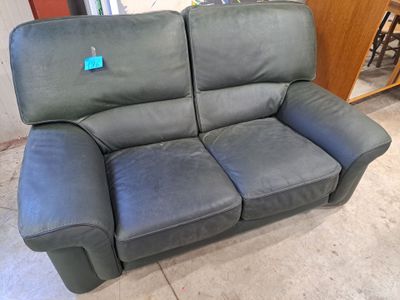 a couch that is sitting in the middle of a room