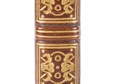 a tall book that has a design on it