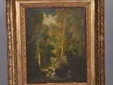an oil painting on a easel with a painting of people in the woods