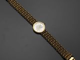 une montre-bracelet en or 18 carats