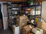 a room with a lot of boxes and boxes on the floor