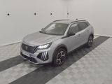 a silver suv parked in a garage with a checkered floor