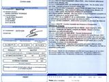 un gros plan d'un document sur lequel figure la photo d'une personne