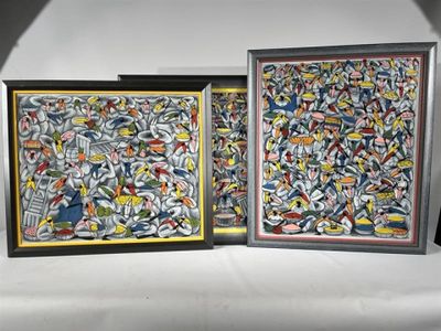 two framed pictures of a painting on a white surface