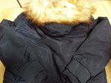 navy blue jacket with faux fur collar and cuffs