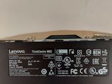 the back of a laptop computer with a hard drive on top of it