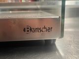 a close up view of a toaster on a table