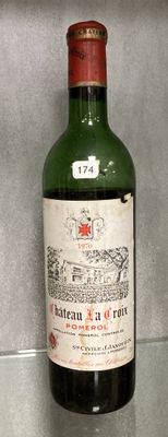 a bottle of wine that is sitting on a counter