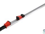 a close up of a metal rod with a red handle