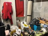 a cluttered room with a lot of clutter on the table