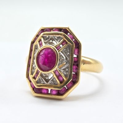 an antique ruby and diamond ring in yellow gold