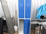 two blue lockers next to each other in a room