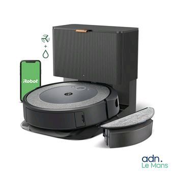 an image of a robotic vacuum cleaner with a phone next to it