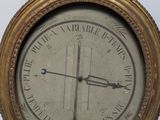 a clock that is hanging on the wall in the room