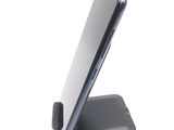 a close up of a cell phone on a stand