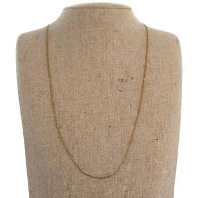 a close up of a mannequin torso with a necklace on it