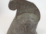 roman helmet on a white surface with a white background