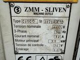 a sign on the side of a machine that says 3 mm silver