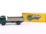 a green toy truck with a box on the back of it