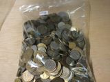a bag full of coins sitting on a table