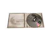 a cd in a clear case on a white surface