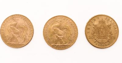 three gold sovereigns, one of which is a sovereign and one of which is a sovereign