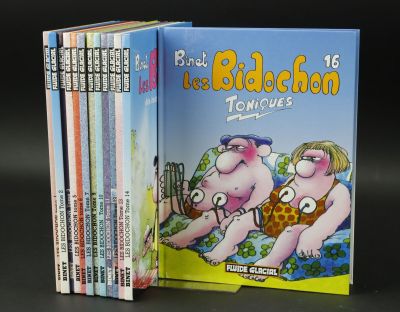 a lot of children ' s books that are on the table