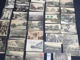 an image of a bunch of old postcards sitting on top of a table