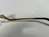a close up of a pair of glasses on a white surface