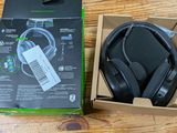 a box with a pair of headphones in it on a table
