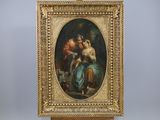 an oil painting of a woman holding a child on a easel