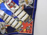 an image of a blue and red scarf with a picture of an eagle