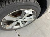 a close up of a tire on a car