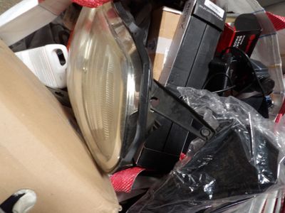 a pile of assorted items sitting in a pile
