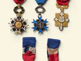 five medals and a medal on a white background