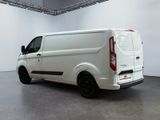 a white van that is parked in a room