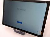 an image of a tablet computer sitting on top of a white table