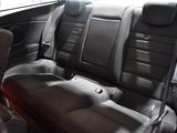 a picture of a car with a black leather seat cover