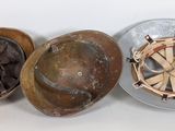 three hats sitting next to each other on a table